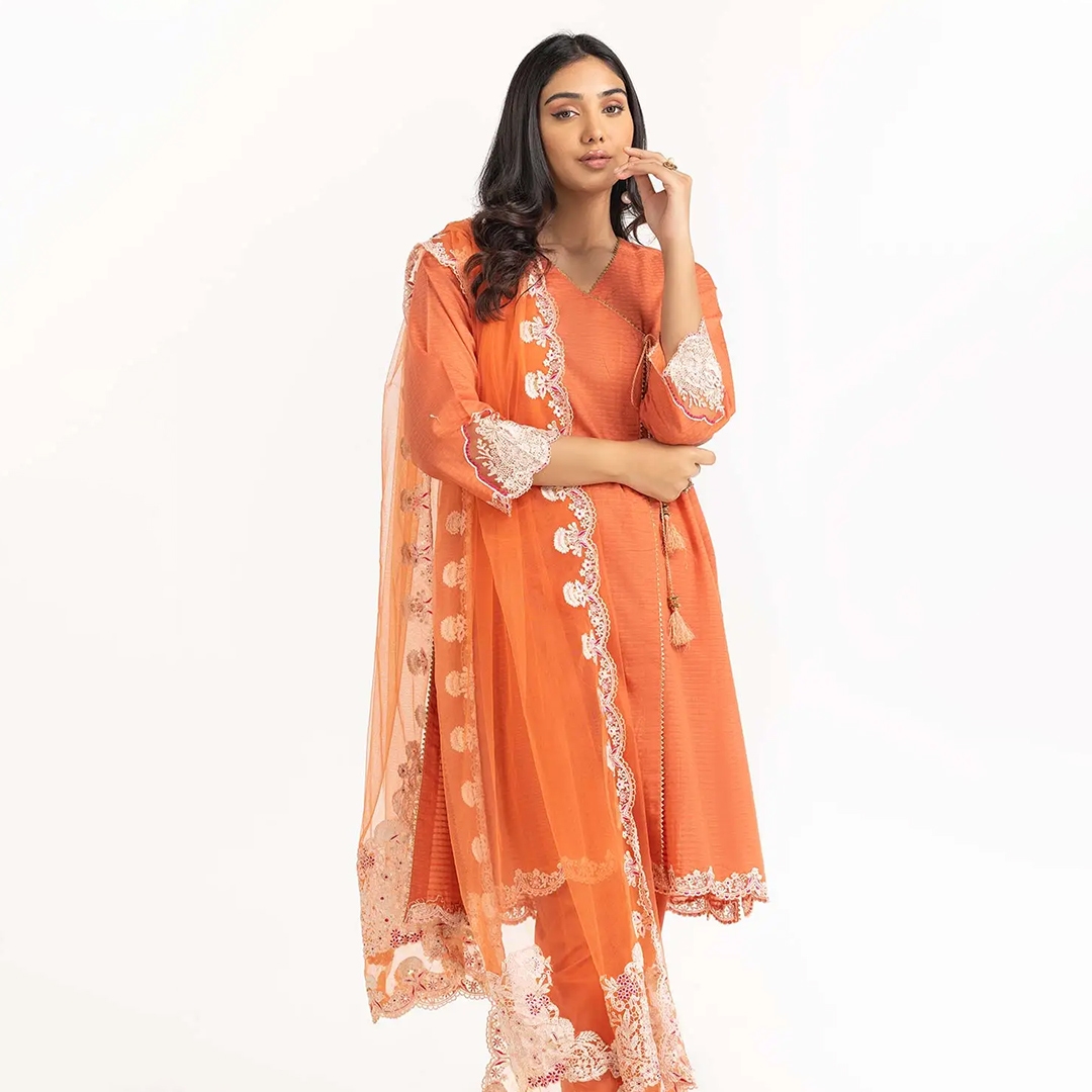 women orange pakistani ready to wear suit